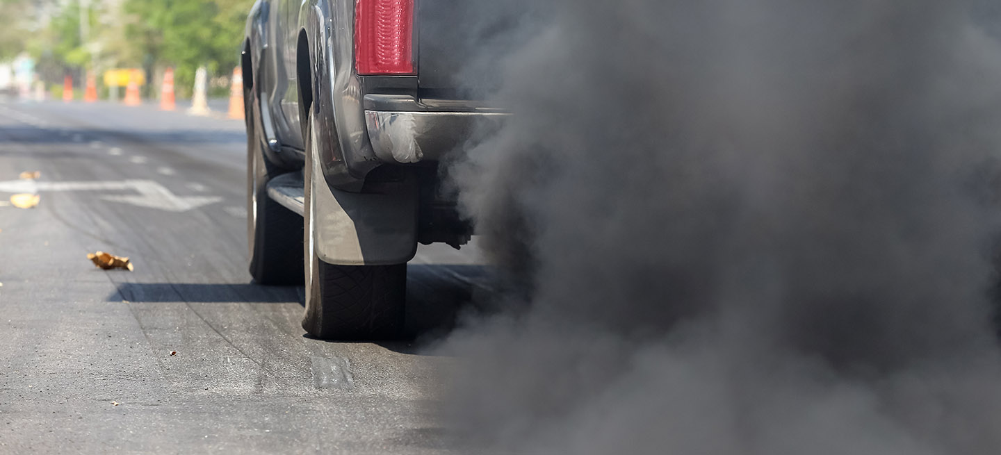 air pollution from vehicle exhaust pipe