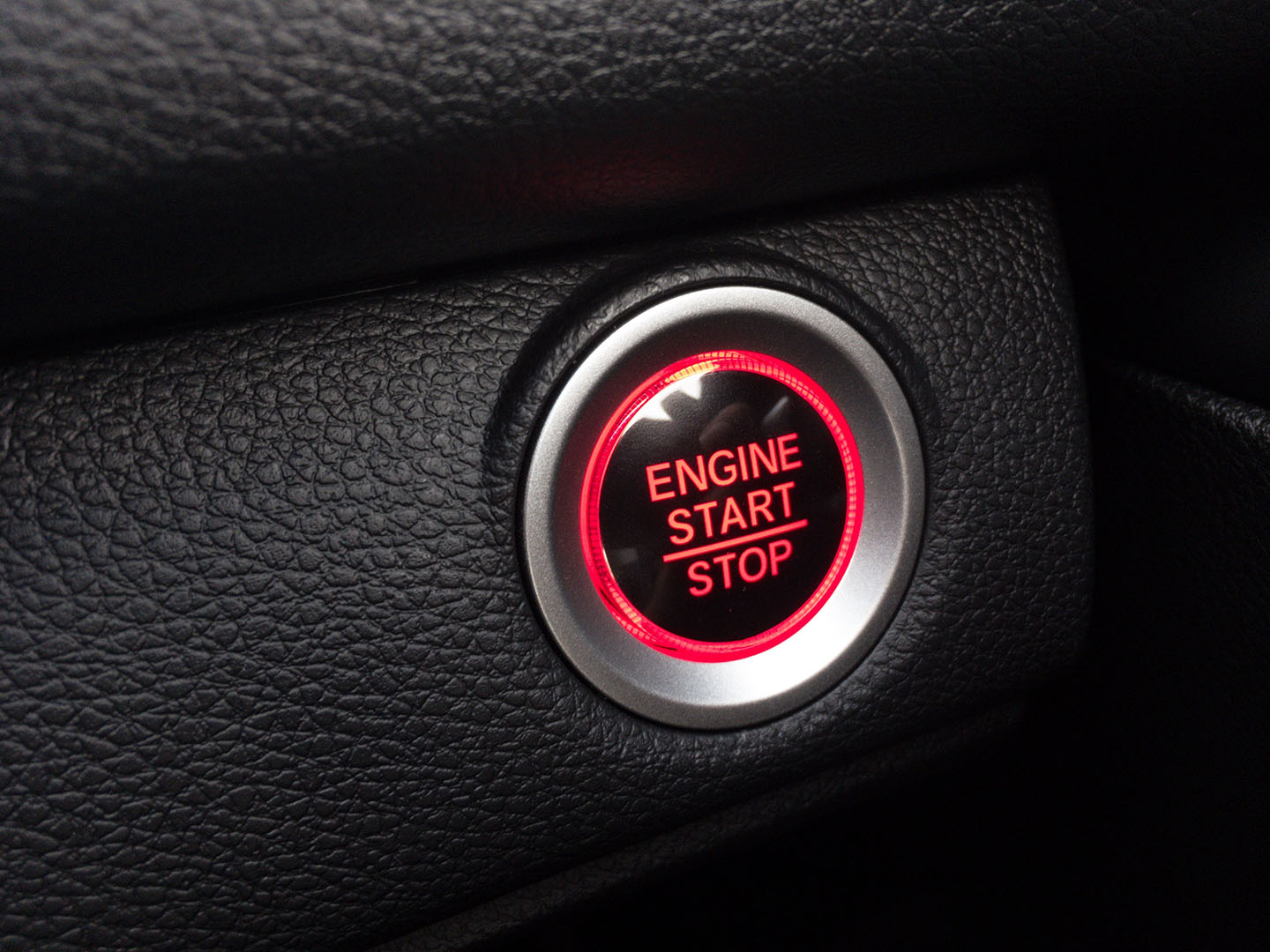Engine start / stop button in luxury car