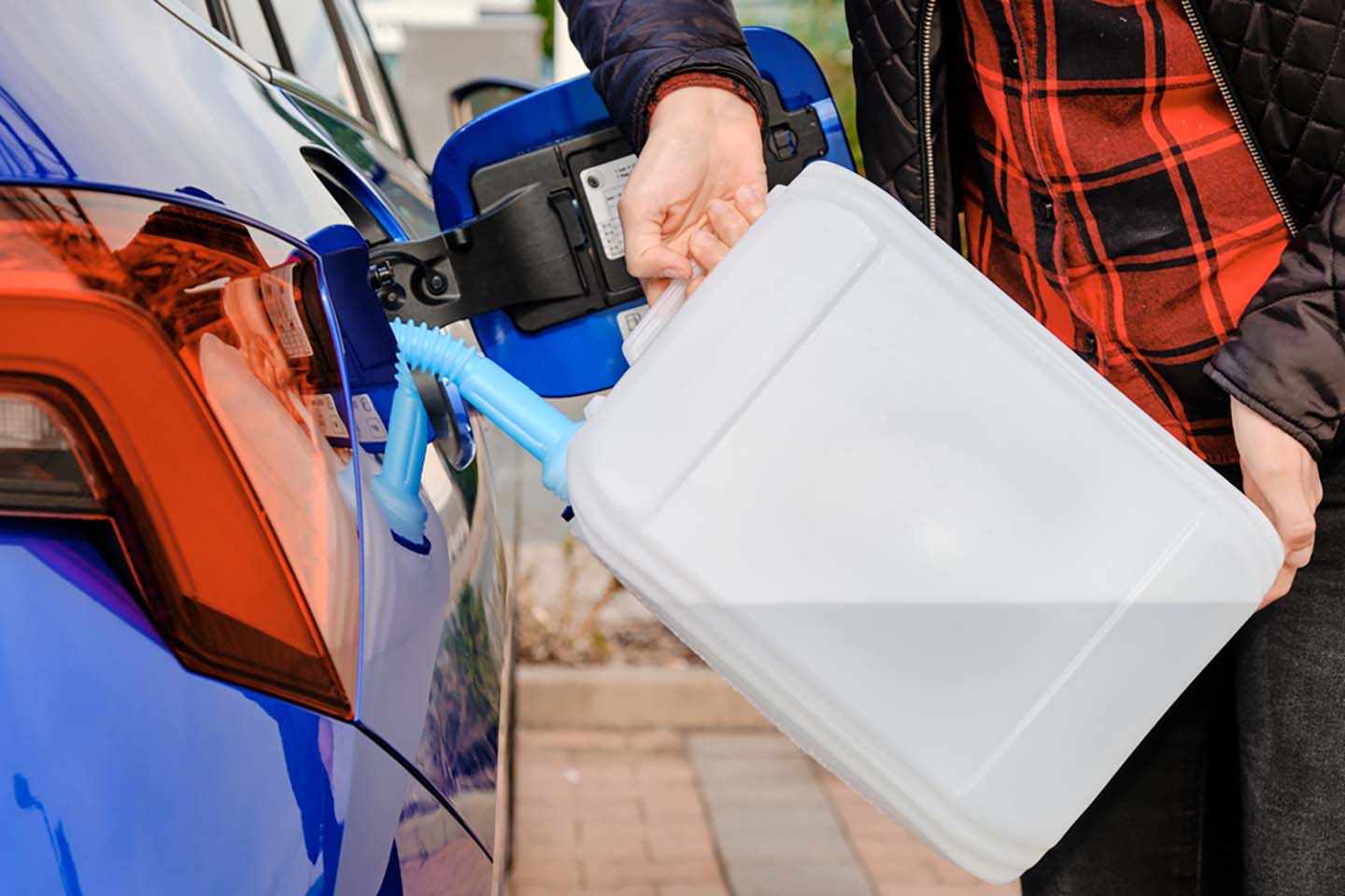 filling diesel engine fluid canister