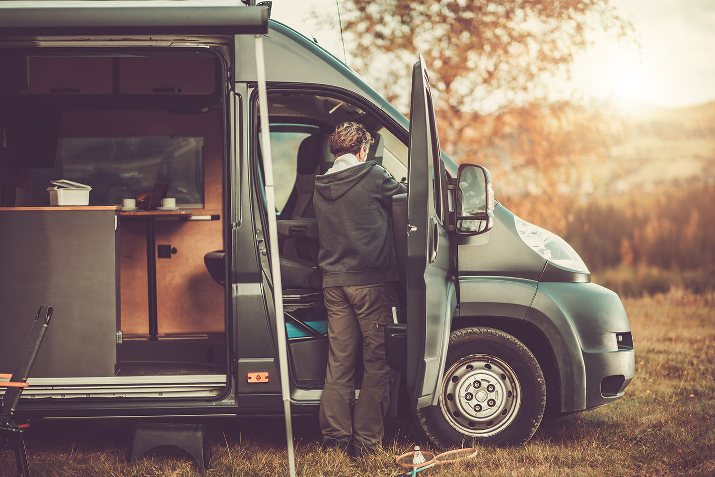 man getting into an rv