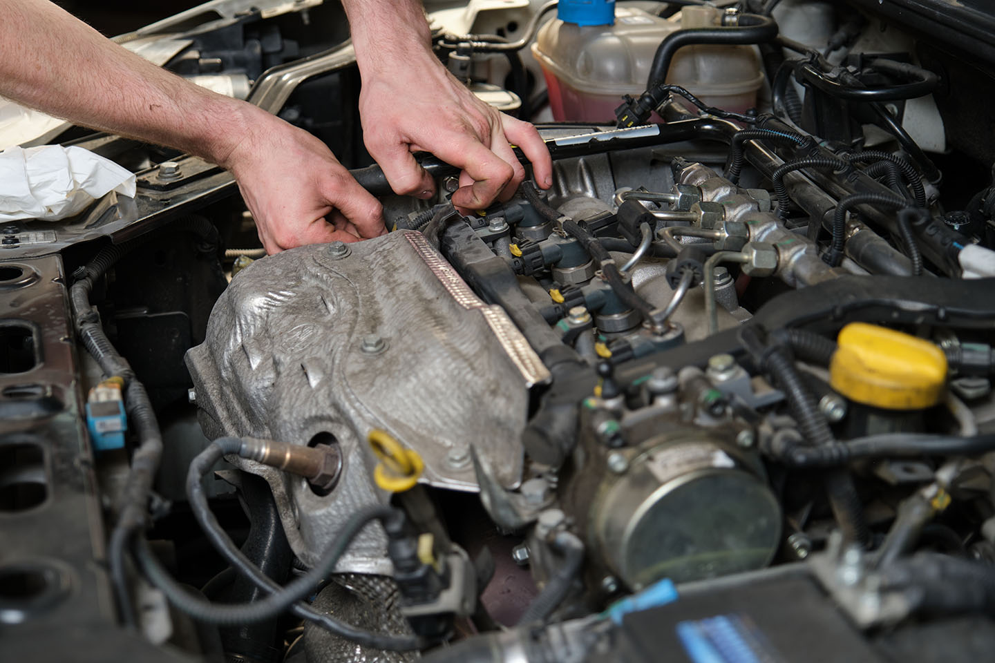 Car Mechanic Hands Replacing Camshaft Position