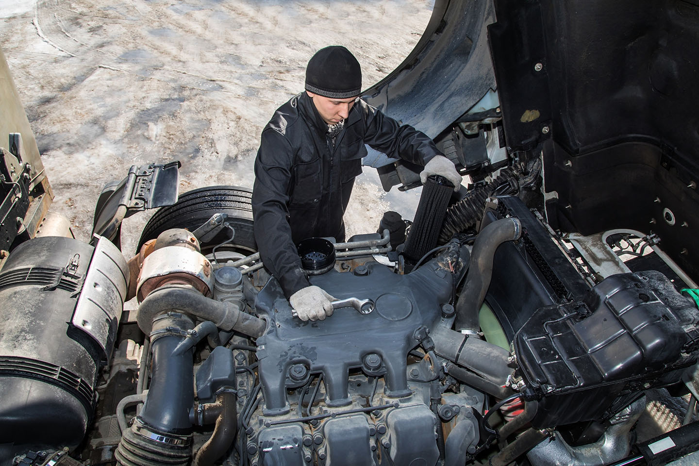 Mechanic Repairing Truck