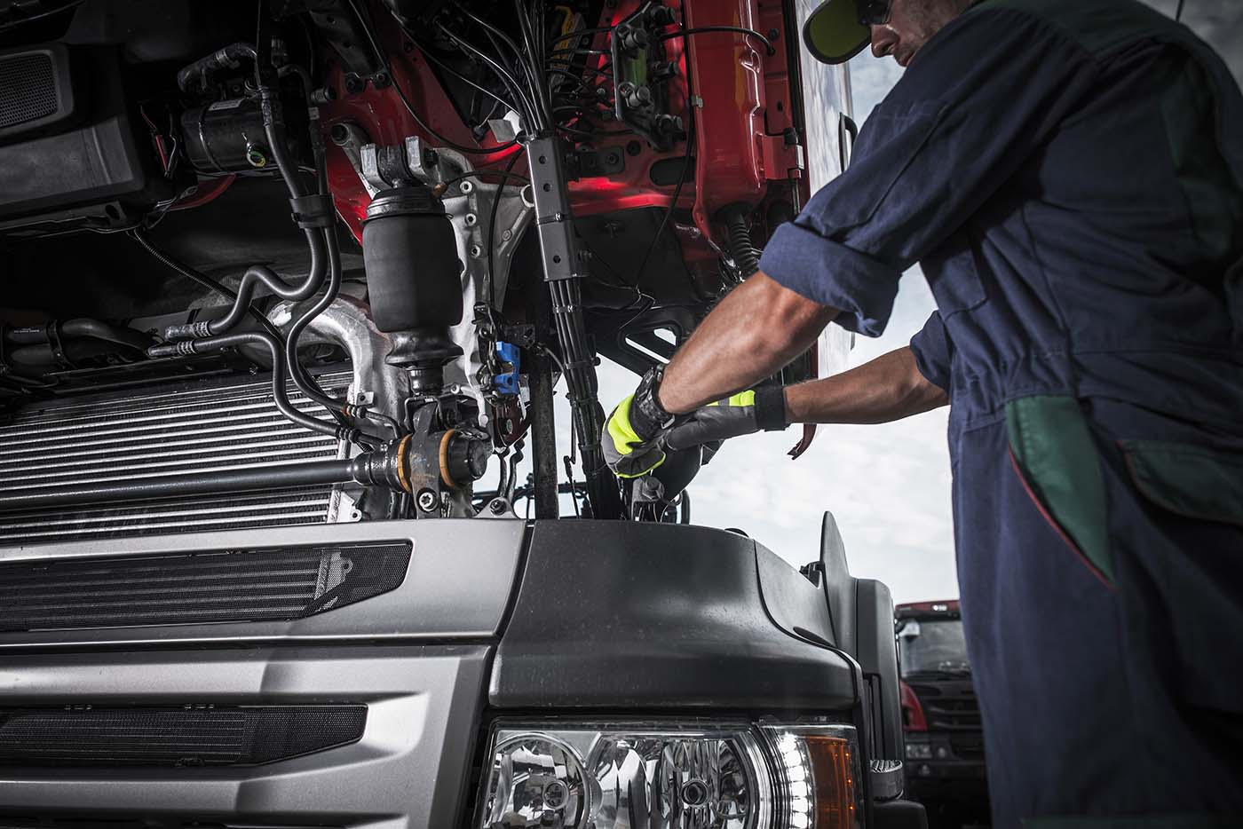 mechanic doing repairs to a car