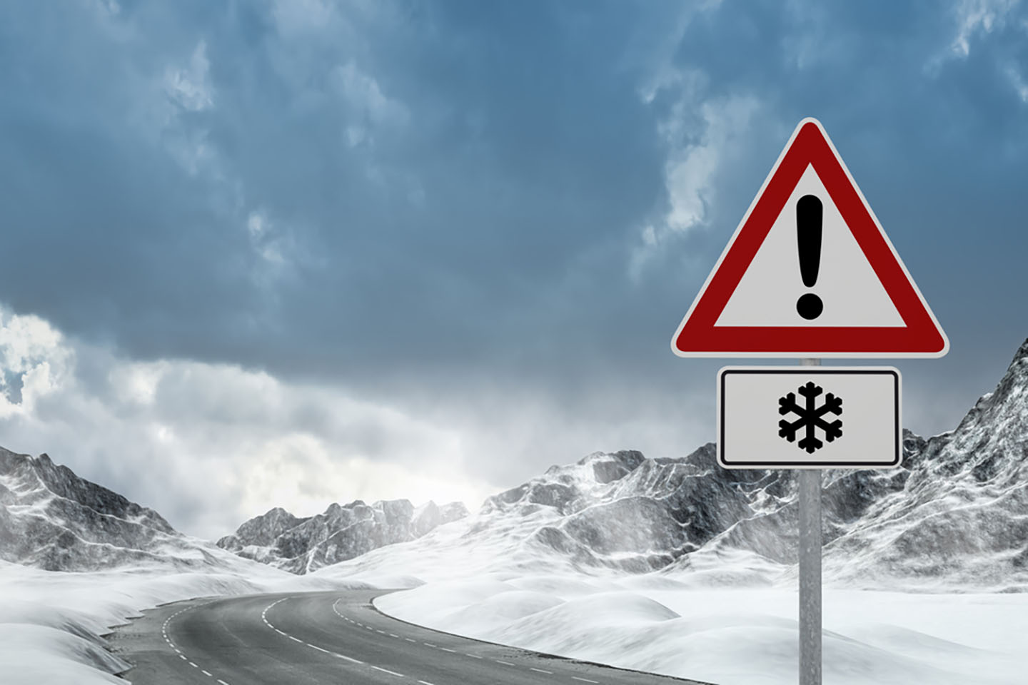 winter driving road warning sign